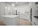 Modern kitchen featuring an island with white countertops at 2511 N Grady Ave # 43, Tampa, FL 33607