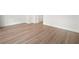 Living room showcases laminate flooring, white walls, and modern trim at 2511 N Grady Ave # 43, Tampa, FL 33607