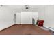 Large garage with ample space for parking and storage featuring white walls and neutral flooring at 2627 Hancock St, Plant City, FL 33563