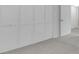 Bedroom featuring neutral walls, carpet, and white closet doors at 2681 Sabal Springs Cir # 204, Clearwater, FL 33761