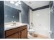 Bathroom with single sink vanity, tile flooring, and tub with shower at 2706 Lantern Hill Ave, Brandon, FL 33511