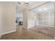 Open-concept layout with tile entry and views to the adjacent living space, dining and kitchen at 2706 Lantern Hill Ave, Brandon, FL 33511