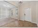 Welcoming foyer with tile flooring, neutral walls, and a view into the adjacent living space, with natural light at 2706 Lantern Hill Ave, Brandon, FL 33511