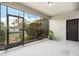 Cozy screened porch providing a seamless transition to the outdoors at 2706 Lantern Hill Ave, Brandon, FL 33511