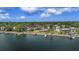 Scenic waterfront property with lush landscaping and a private dock at 2800 Coffee Pot Ne Blvd, St Petersburg, FL 33704