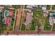 Aerial view of a home with tile roof and landscaping at 2800 Coffee Pot Ne Blvd, St Petersburg, FL 33704