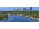 Beautiful waterfront view with docks and skyline in the background at 2800 Coffee Pot Ne Blvd, St Petersburg, FL 33704