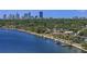 Waterfront homes with docks, lush green trees, and beautiful skyline at 2800 Coffee Pot Ne Blvd, St Petersburg, FL 33704