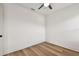 Bright bedroom features wood-look floors and a ceiling fan at 301 S Daniels St, Plant City, FL 33563