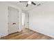 Bedroom with wood floors, ceiling fan and white walls at 301 S Daniels St, Plant City, FL 33563
