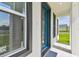 Elegant front door featuring a decorative glass design and an outdoor view of the property at 301 S Daniels St, Plant City, FL 33563