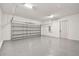 Spacious two-car garage with epoxy flooring at 301 S Daniels St, Plant City, FL 33563