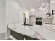 Remodeled kitchen featuring quartz countertops, an undermount sink, and a matte black faucet and cabinet hardware at 301 S Daniels St, Plant City, FL 33563