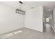 Open concept area with tile flooring and modern lighting at 301 S Daniels St, Plant City, FL 33563