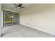 Covered patio with large sliding glass doors at 301 S Daniels St, Plant City, FL 33563
