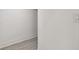 Close up on a white wall and trim with tile floors and a light switch at 301 S Daniels St, Plant City, FL 33563