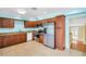 This kitchen features stainless steel appliances and tile floors at 3115 Bay Ln, Clearwater, FL 33759