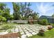 Backyard features patio, above ground pool, and convenient storage sheds at 4537 Thornton Dr, Zephyrhills, FL 33542
