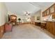 Bright living room area with a decorative fireplace and tv enhancing the home's charm at 4537 Thornton Dr, Zephyrhills, FL 33542