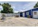 Spacious backyard featuring patio and privacy fence at 4727 Town N Country Blvd, Tampa, FL 33615
