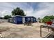 View of the home's backyard with patio at 4727 Town N Country Blvd, Tampa, FL 33615