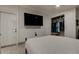 Bedroom with closet, television, and outside door at 4727 Town N Country Blvd, Tampa, FL 33615