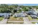 Charming single-story home featuring a well-manicured lawn, driveway and a welcoming facade at 5414 Oceanic Rd, Holiday, FL 34690