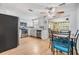 Well-lit kitchen with modern stainless steel appliances and granite countertops at 5414 Oceanic Rd, Holiday, FL 34690