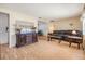 Bright living space featuring laminate flooring and stylish decor at 5414 Oceanic Rd, Holiday, FL 34690