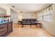 Spacious living room with laminate flooring and ample natural light at 5414 Oceanic Rd, Holiday, FL 34690