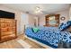 Spacious main bedroom with hardwood floors and large dresser at 5414 Oceanic Rd, Holiday, FL 34690