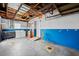 Spacious basement with laundry, and utility connections offers practical storage and workspace at 5627 57Th N Ave, St Petersburg, FL 33709