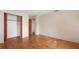 Bedroom featuring hardwood floors, closet, and natural light from the window at 5631 23Rd S Ave, Gulfport, FL 33707