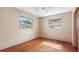 Bedroom with hardwood floors, a ceiling fan, and natural light at 5631 23Rd S Ave, Gulfport, FL 33707