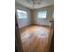 Bright bedroom with hardwood floors, multiple windows, offering natural light and a cozy atmosphere at 5631 23Rd S Ave, Gulfport, FL 33707