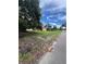 Vacant grassy lot next to the street, offering potential for development or landscaping at 5631 23Rd S Ave, Gulfport, FL 33707