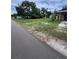 Street view of a vacant lot showing an empty lot next to a street in a residential area at 5631 23Rd S Ave, Gulfport, FL 33707