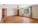 Spacious living room with hardwood floors and natural light streaming through the windows at 5631 23Rd S Ave, Gulfport, FL 33707