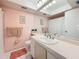 Bright bathroom with a big mirror, fresh light fixtures, and a tidy vanity at 5870 38Th N Ave # 44, St Petersburg, FL 33710