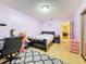 Inviting bedroom with a cozy rug, desk and convenient ensuite access at 5870 38Th N Ave # 44, St Petersburg, FL 33710