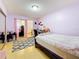 Bright bedroom with a desk, ensuite bathroom, and large closet at 5870 38Th N Ave # 44, St Petersburg, FL 33710