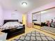 Cozy bedroom featuring a mirrored closet and a comfortable bed at 5870 38Th N Ave # 44, St Petersburg, FL 33710