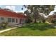 Property featuring well-manicured lawn and mature tree providing ample shade at 5870 38Th N Ave # 44, St Petersburg, FL 33710