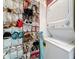 Practical laundry area with stacked washer/dryer and ample shoe storage at 5870 38Th N Ave # 44, St Petersburg, FL 33710