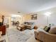 Spacious living room area with neutral tones, tile flooring, and comfortable seating at 5870 38Th N Ave # 44, St Petersburg, FL 33710