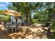 Expansive wood deck area features dining area and outdoor seating in the backyard at 6016 N Dexter Ave, Tampa, FL 33604