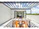 Outdoor seating area with stylish rug and view of the living room at 6210 64Th N Way, Pinellas Park, FL 33781