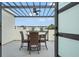 Charming patio with stylish furniture and overhead trellis at 6210 64Th N Way, Pinellas Park, FL 33781