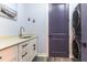 Convenient laundry room features modern appliances and elegant marble countertops at 7683 Summerland Cv, Lakewood Ranch, FL 34202