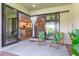 Inviting outdoor patio with stylish furniture and seamless access to indoor living spaces at 7683 Summerland Cv, Lakewood Ranch, FL 34202